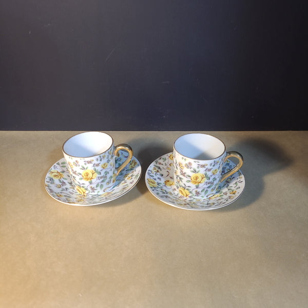 Pair of Yellow Floral Demitasse and Saucer Sets