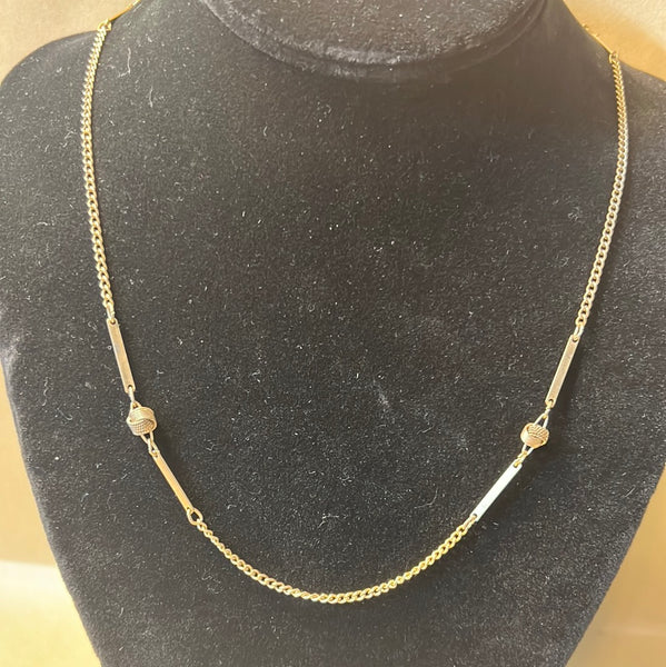 Gold Tone Necklace with Bars & Knot Accents