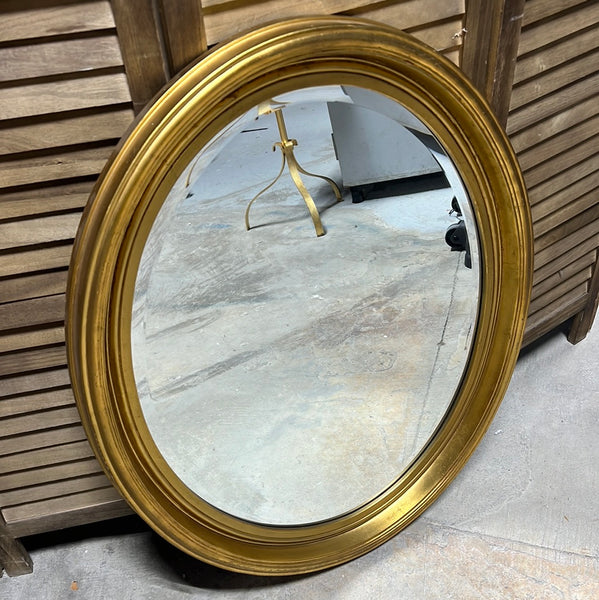 Oval Gold Mirror by the Stroupe Mirror Company