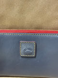 Dooney & Bourke Navy Blue And Red Florentine Large Zip Around Wristlet