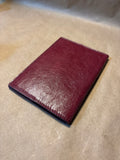 Burgundy Tumi Passport Holder