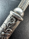 Floral Embossed Repoussé Slotted Spoon with Sterling Silver Handle