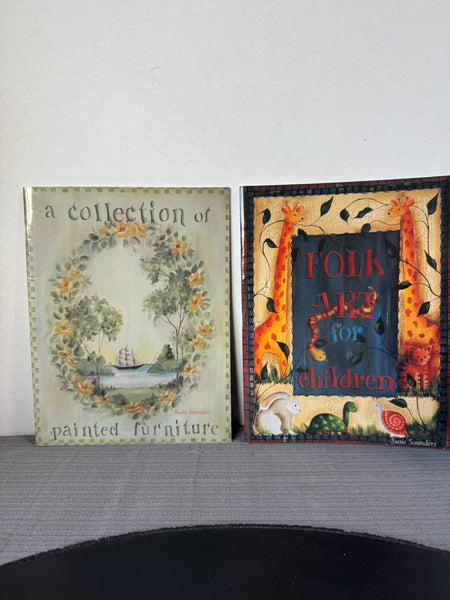 (H) Pair of Signed Susie Saunders Folk Art Painting Books