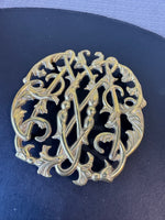(A) Virginia Metalcrafters 1950 Brass Colonial Williamsurg Cypher Trivet