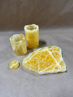 4 Piece Honeycomb Calcite Candle Holders And Honeycomb Calcite Slabs