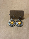 Round Silver Tone Earrings with Yellow Bead