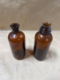 Pair Of Amber Glass Medicine Jars