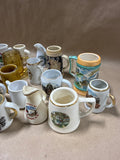 (A) 22 Piece Mini Stein Souvenir Glasses