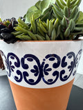 Faux Succulent Arrangement in Terracotta Pot with Blue & White Design
