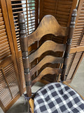 Round Table with (2) Leaves and (4) Ladder Back Chairs, with Plaid Seat Cushions.