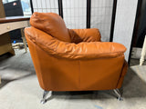 Mid Century Style Leather Chair, terra cotta/burnt orange color