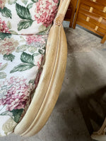 Wicker Chair and Ottoman with Floral Cushions
