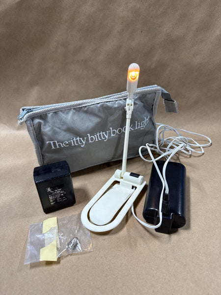 The Itty Bitty Book Light Clip On Light With Charging Bank WORKS