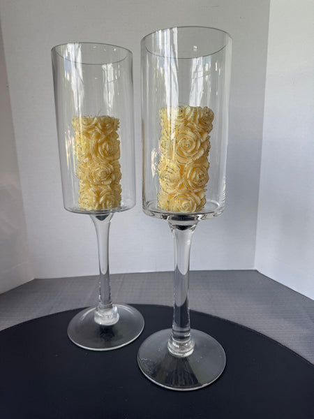 Pair of Pier 1 Glass Pedestal Hurricanes with Rose Carved Pillar Candles