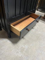 Black Particle Board Cabinet with Pumpkin Knobs