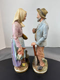 Pair of Homco Porcelain Figurines: Old Man & Woman Gardening