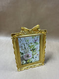Gold Ornate Frame With Bow