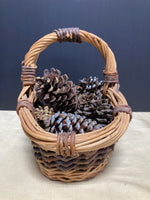 Woven Basket Full of Pinecones