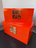 Pair of Galt International Orange Enamel Storage Boxes with Geometric Accent