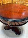 Bombay Round Accent Table with Sliding Doors
