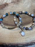 Pair of Bracelets with Feather Details