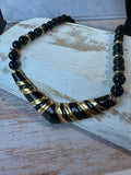 Black & Gold Tone Beaded Vintage Necklace with Boomerang Pendant