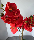 Bright Orange Faux Orchids in Ceramic Pot
