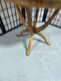 Round Wooden Occasional Table with Mid Century Flair