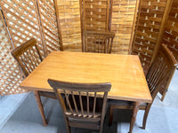 Dining Table with (4) Chairs by Ashley Furniture