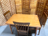Dining Table with (4) Chairs by Ashley Furniture