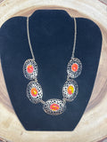 Gold Tone Necklace with Opalescent Orange Beads