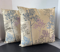 Pair of Champagne Throw Pillows with Multicolored Dandelions