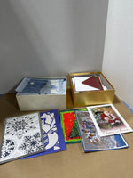 Assorted Variety Of Holiday Cards And Envelopes