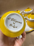 Yellow And Gold Teacups With Lids And Marching Tray