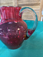 (A) Cranberry Glass Pitcher