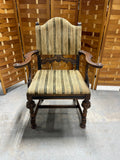 Antique Arm Chair with Carved Accents