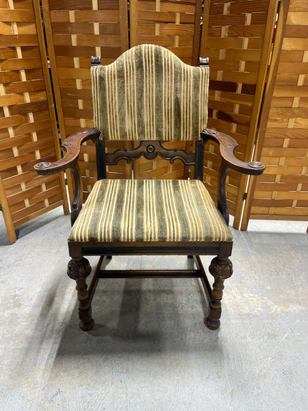 Antique Arm Chair with Carved Accents