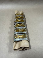Silver And Brass Bow Napkin Rings