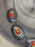 Gold Tone Necklace with Opalescent Orange Beads