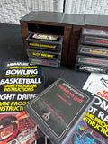 Lot of 8 Assorted Atari 2600 & 7800 Games with Manuals in 8-Cartridge Musicmate Modular Storage Rack (B)