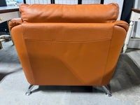 Mid Century Style Leather Chair, terra cotta/burnt orange color