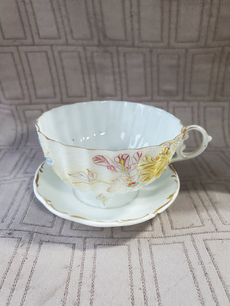 Gold, Pink, Blue, and White Floral Teacup and Saucer Set