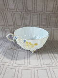 Gold, Pink, Blue, and White Floral Teacup and Saucer Set