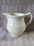 Cream Colored Ceramic Milk Pitcher