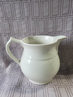 Cream Colored Ceramic Milk Pitcher