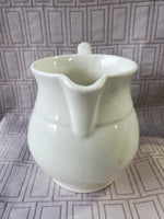 Cream Colored Ceramic Milk Pitcher