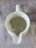 Cream Colored Ceramic Milk Pitcher