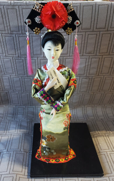 (B) Geisha Doll