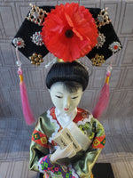 (B) Geisha Doll