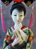 (B) Geisha Doll